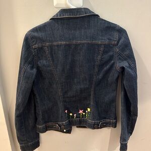 Dark denim jacket with custom embroidered flowers